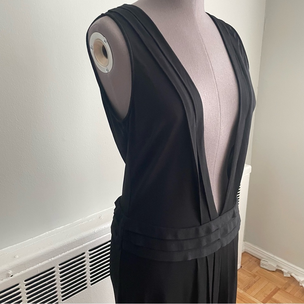 St. John couture black sleeveless dress with deep plunge neckline and drop waist